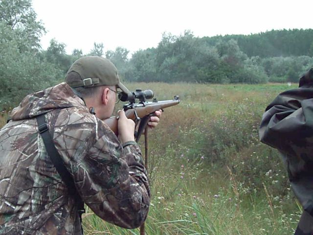 If you look just above the guide's arm, you will see  a white puff of water droplets as the bullet hits home on the deer 100m away.  The 9.3x62 shell is very powerful for such a small animal, but guaranteed a quick, clean kill.
