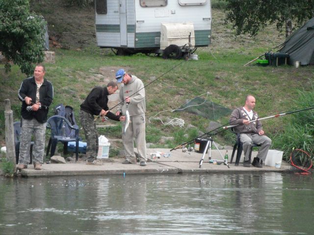 The guy in the left owns this fishing area.  Needless to say, his friends did well.