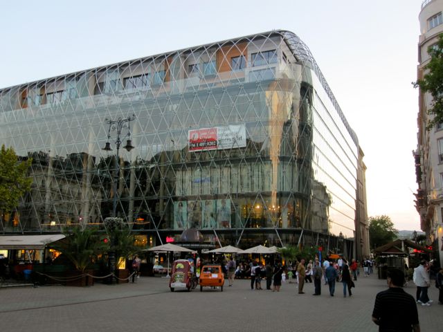 Shopping mall, enclosed in glass.