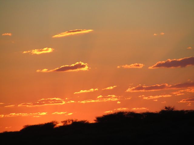 Another gorgeous Namibian Sunset.  

Dale invented a drink, consisting of:
1 shot blended scotch whiskey
4 ounces Fanta
Pour into a rocks glass and top up with ice.

We named this drink a 