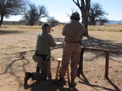 Conferring with Corney.  Nothing wrong with my technique, time to start looking at the rifle