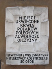 Memorial plaque to polish killed by the Nazis in 1944