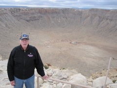 The crater.  Dale for scale.  The hole is 4,000 feet across.  How big is that?  Follow along.  See that white spot on the floor of the crater, past dad's shoulder?  Look at the next photo