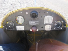 My instrument panel.  L-R: Altimiter, Airspeed, release knob (red) and climb/dive meter.  Very basic.  Besides this there was a trim lever by my left knee.  Stick & rudder pedals.  Also a lever for the dive brakes that also brakes the main wheel.  That's it.