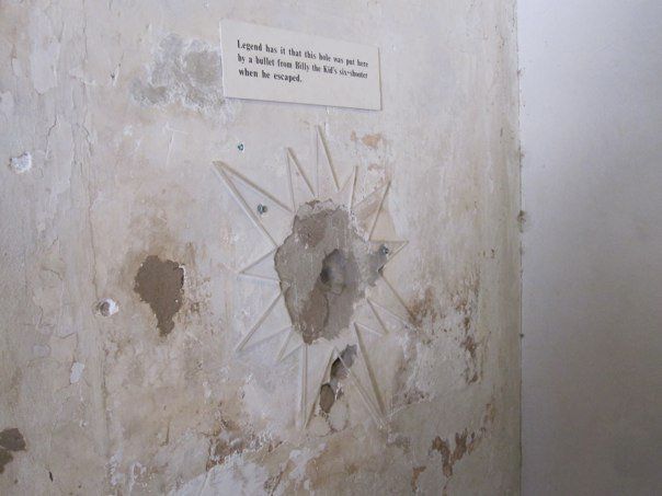 Bullet hole in wall where Billy shot Bob Olinger in his April 28, 1881 escape