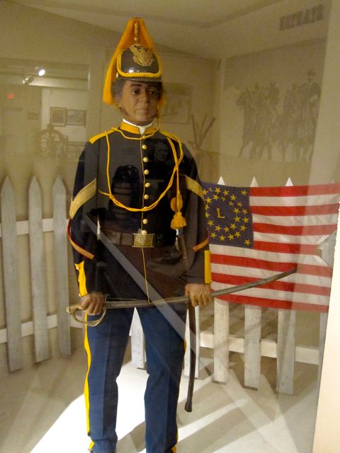 Buffalo soldier Sergeant in full-dress uniform.  Similar to the blues we still wear today.