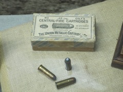 .45 Colt centerfire cartidges.

35 grains of black powder

250 grain lead bullets