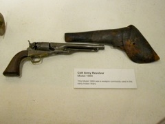 Colt 1860 Army revolver, .44 percussion, with cavalry holster.  Cavalrymen shot their revolvers with the left hand, saber in the right.